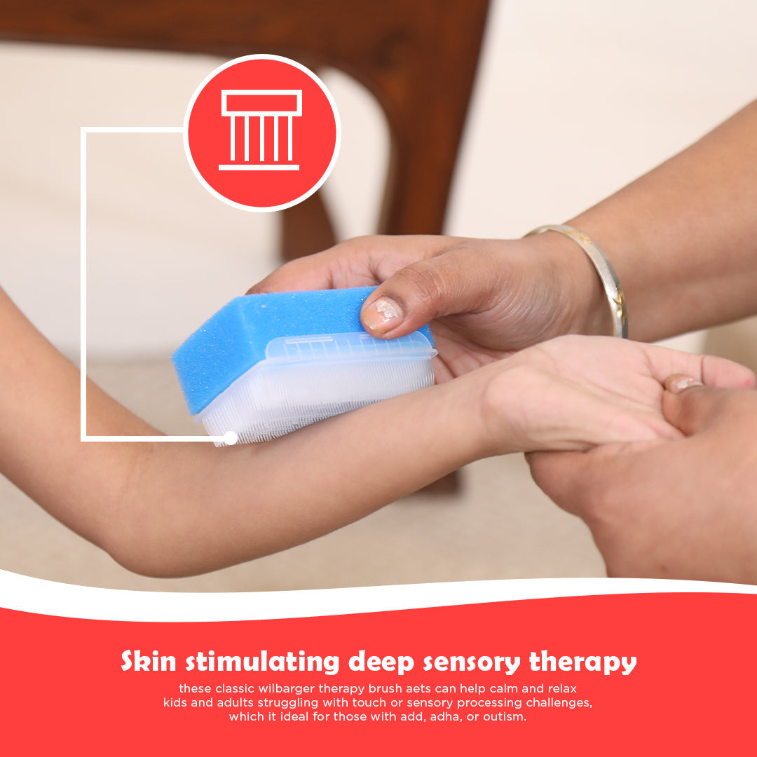 Ableys sensory brush and sponge dual-sided used by therapist on child forearm for skin stimulating deep sensory therapy