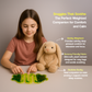 Ableys weighted vibrating plush bunny beige sensory stuffed rabbit beside girl using green fidget pads for calming